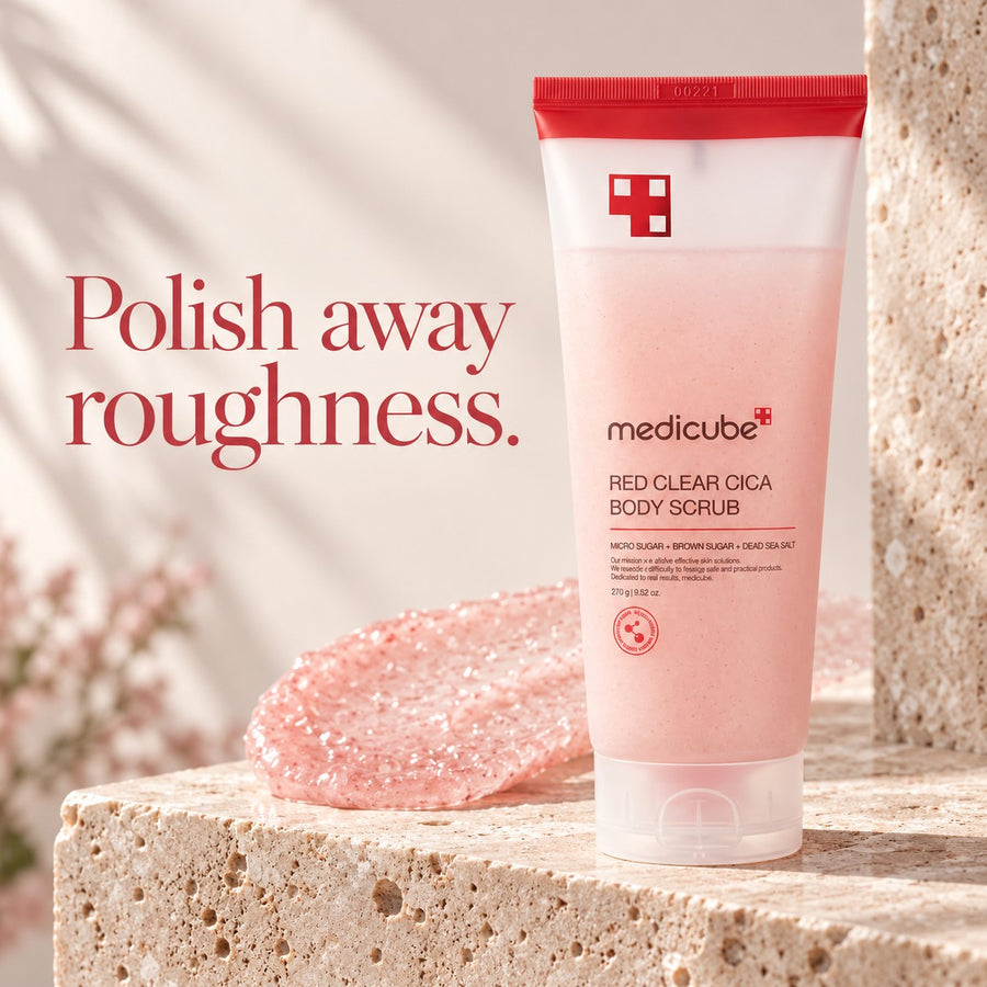 Exfoliante Corporal medicube Red Clear Cica 270 g, envase sobre una base de piedra