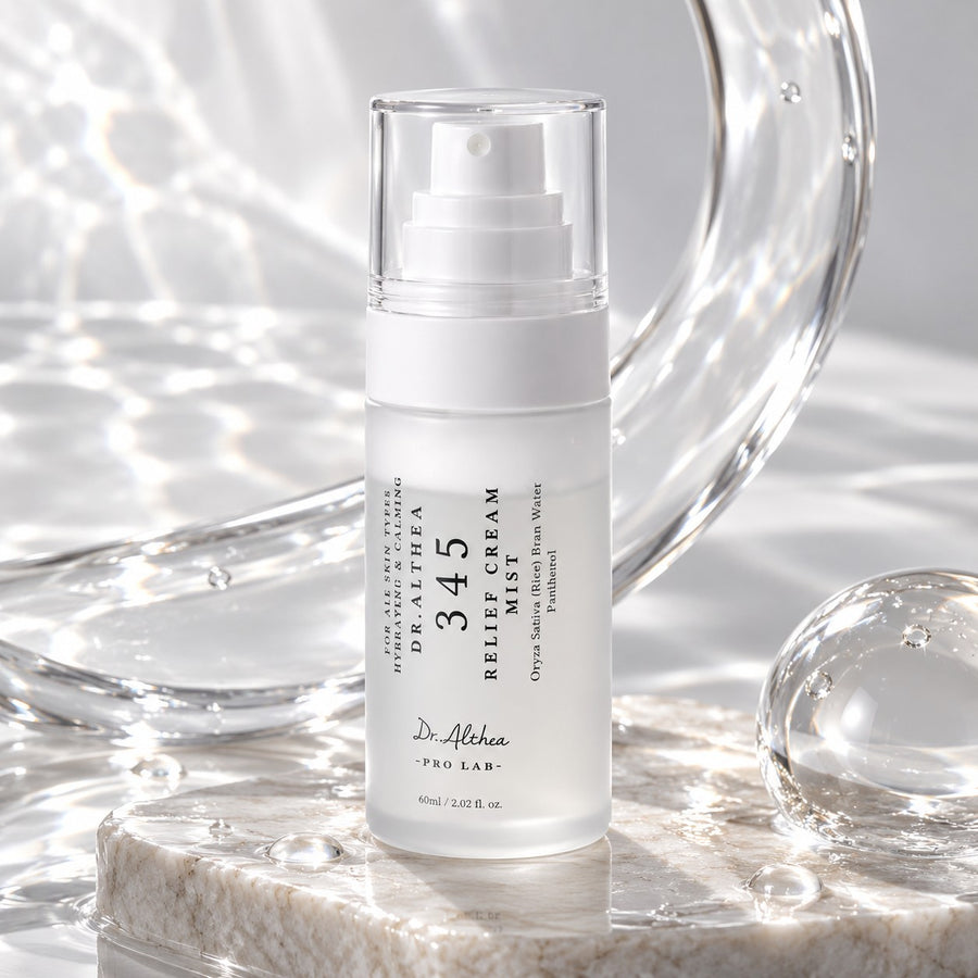Kit Confort Dr.Althea: bruma 345 Relief Cream Mist sobre una piedra junto a cristal