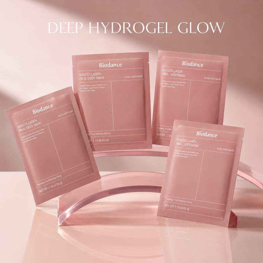 Kit Colágeno Biodance: sobres de mascarilla Bio Collagen Real Deep Mask sobre un arco rosa