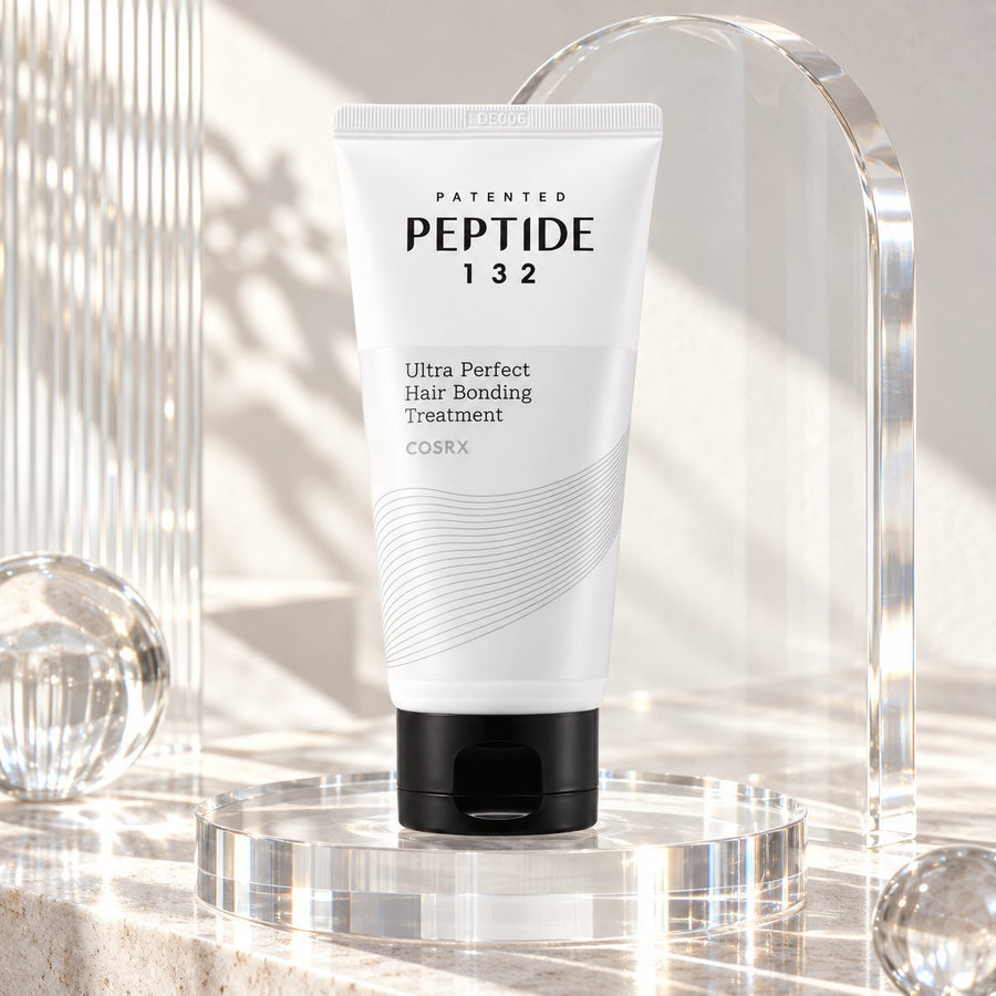 Mascarilla Capilar COSRX Peptide-132 sobre piedra y cristal